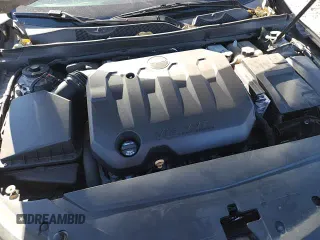 2019 Chevrolet Impala Premier z VIN 1G1105S35KU126237, wystawiony jako Copart lot #90950075 z przebiegiem 103 875 mil mil oraz Szkoda całkowita • Salvage title. Historia ofert i sprzedaży dostępna na DreamBid. Obrazek 14.