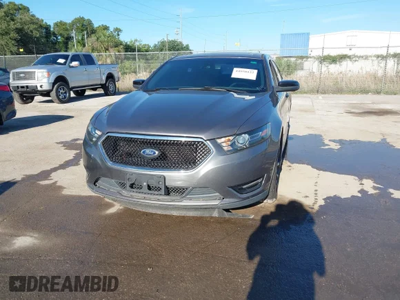✅ 2014 Ford Taurus SHO • VIN: 1FAHP2KT4EG112368 • Lot: 44950122. Wystawiony na IAAI z przebiegiem 109 386 mil. Bezpłatny archiwum sprzedaży aukcyjnych z USA i szczegółowy raport historii pojazdu na DreamBid. Zdjęcie 6.