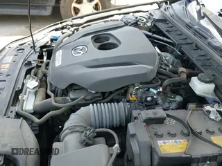 ✅ 2024 Mazda 3 Carbon Edition • VIN: JM1BPBYY1R1710008 • Лот: 42453769. Опубликован ранее на IAAI с пробегом 35 256 миль. Бесплатный доступ к архиву аукционных продаж из США и подробный отчёт об истории автомобиля на DreamBid. Изображение 19.