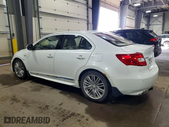✅ 2013 Suzuki Kizashi SLS Sport • VIN: JS2RF9A8XD6100114 • Лот: 79169825. Опубліковано раніше на Copart з пробігом 164 428 миль. Безкоштовний доступ до архіву аукціонних продажів зі США та докладний звіт про історію автомобіля на DreamBid. Зображення 2.