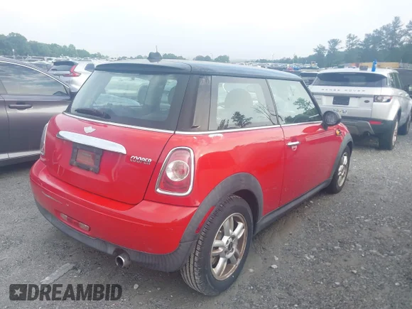 ✅ 2013 MINI Hardtop • VIN: WMWSU3C52DT692074 • Lot: 45234865. Listed on IAAI with 143,610 mi. Free auction sales archive from the USA and detailed vehicle history report at DreamBid. Image 4.