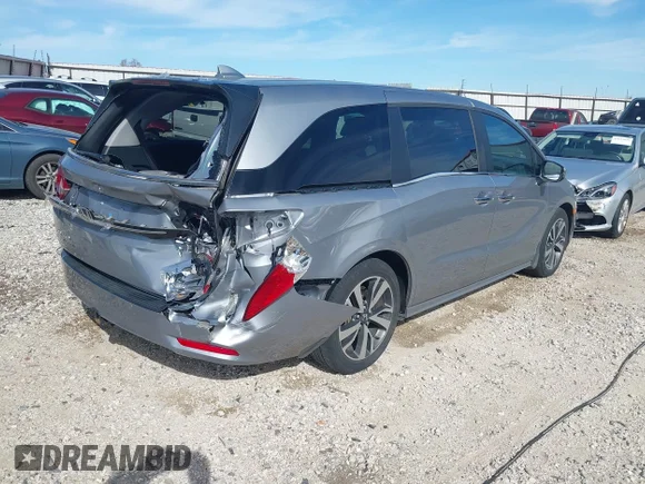 ✅ 2023 Honda Odyssey Touring • VIN: 5FNRL6H82PB071210 • Lot: 43667176. Listed on IAAI with 43,210 mi. Free auction sales archive from the USA and detailed vehicle history report at DreamBid. Image 4.