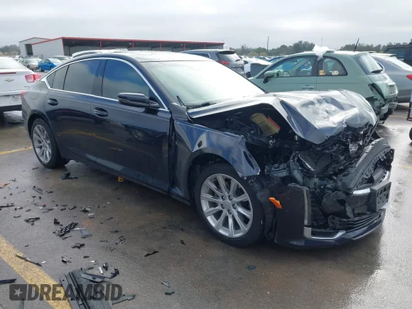 ✅ 2021 Cadillac CT5 Luxury • VIN: 1G6DW5RK5M0112688 • Lot: 43914033. Listed on IAAI with 53,666 mi. Free auction sales archive from the USA and detailed vehicle history report at DreamBid. Image 1.