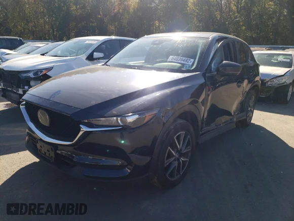 ✅ 2018 Mazda CX-5 Touring • VIN: JM3KFBCM1J0336203 • Lot: 64039492. Wystawiony na Copart z przebiegiem Nie podano. Bezpłatny archiwum sprzedaży aukcyjnych z USA i szczegółowy raport historii pojazdu na DreamBid. Zdjęcie 2.