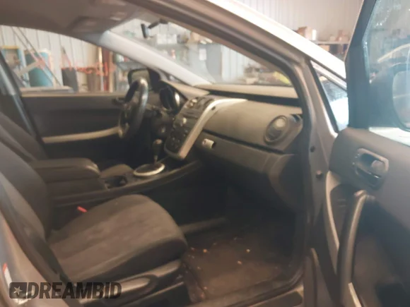 ✅ 2009 Mazda CX-7 Grand Touring • VIN: JM3ER29L990222514 • Лот: 42521398. Опубліковано раніше на IAAI з пробігом 175 274 миль. Безкоштовний доступ до архіву аукціонних продажів зі США та докладний звіт про історію автомобіля на DreamBid. Зображення 5.