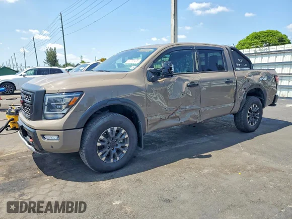 ✅ 2024 Nissan Titan Platinum Reserve • VIN: 1N6AA1ED9RN104101 • Лот: 52235406. Опубликован ранее на Copart с пробегом 17 715 миль. Бесплатный доступ к архиву аукционных продаж из США и подробный отчёт об истории автомобиля на DreamBid. Изображение 1.