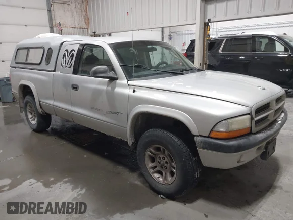 ✅ 2001 Dodge Dakota Sport • VIN: 1B7GG22N41S323293 • Lot: 44630495. Listed on IAAI with 184,723 mi. Free auction sales archive from the USA and detailed vehicle history report at DreamBid. Image 1.