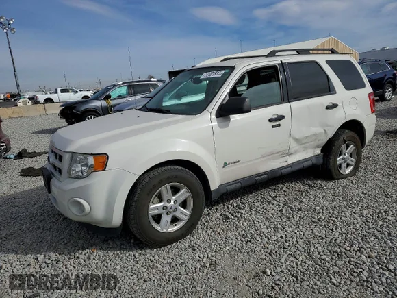 ✅ 2011 Ford Escape Hybrid • VIN: 1FMCU5K36BKC69757 • Lot: 77161915. Wystawiony na Copart z przebiegiem 59 699 mil. Bezpłatny archiwum sprzedaży aukcyjnych z USA i szczegółowy raport historii pojazdu na DreamBid. Zdjęcie 1.
