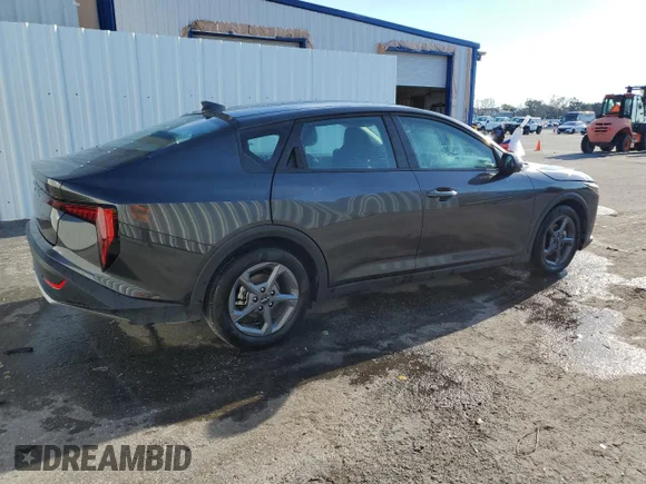 ✅ 2025 Kia K4 LXS • VIN: 3KPFT4DEXSE056715 • Lot: 69221515. Listed on Copart with 14,517 mi. Free auction sales archive from the USA and detailed vehicle history report at DreamBid. Image 3.