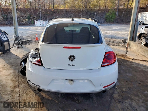 ✅ 2013 Volkswagen Beetle Turbo • VIN: 3VWVA7ATXDM601517 • Lot: 97653585. Wystawiony na Copart z przebiegiem 163 080 mil. Bezpłatny archiwum sprzedaży aukcyjnych z USA i szczegółowy raport historii pojazdu na DreamBid. Zdjęcie 6.