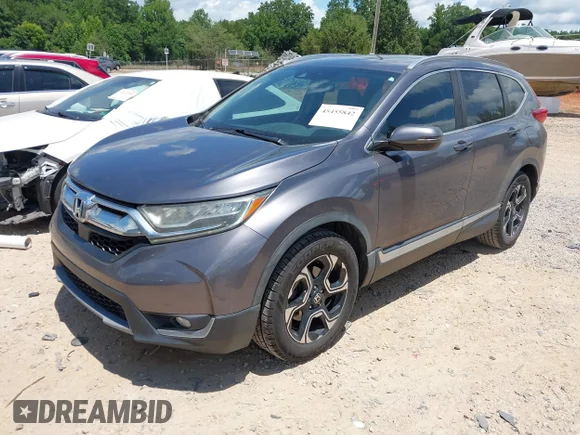 ✅ 2018 Honda CR-V Touring • VIN: 7FARW1H9XJE006202 • Лот: 45455842. Опубликован ранее на IAAI с пробегом 134 700 миль. Бесплатный доступ к архиву аукционных продаж из США и подробный отчёт об истории автомобиля на DreamBid. Изображение 2.