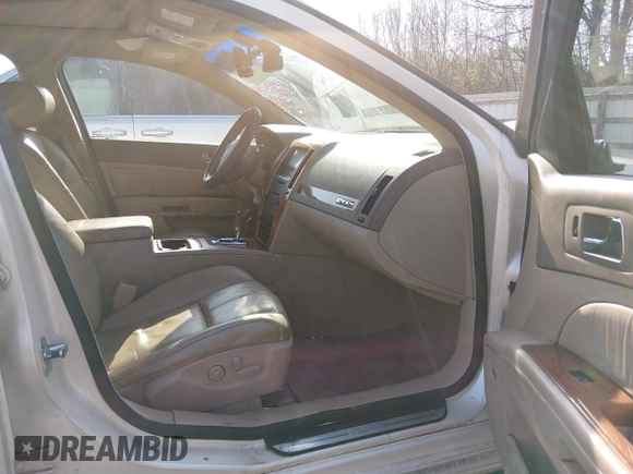 ✅ 2007 Cadillac STS • VIN: 1G6DC67A870134732 • Lot: 44526234. Wystawiony na IAAI z przebiegiem 123 144 mil. Bezpłatny archiwum sprzedaży aukcyjnych z USA i szczegółowy raport historii pojazdu na DreamBid. Zdjęcie 5.
