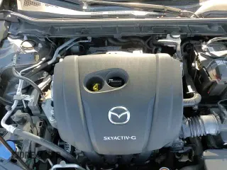 ✅ 2019 Mazda 3 Premium • VIN: JM1BPBNM4K1125558 • Лот: 70306565. Опубликован ранее на Copart с пробегом 48 060 миль. Бесплатный доступ к архиву аукционных продаж из США и подробный отчёт об истории автомобиля на DreamBid. Изображение 14.