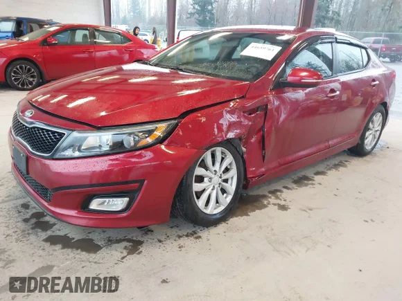 ✅ 2015 Kia Optima LX • VIN: 5XXGM4A72FG473198 • Lot: 44659761. Listed on IAAI with 127,445 mi. Free auction sales archive from the USA and detailed vehicle history report at DreamBid. Image 2.