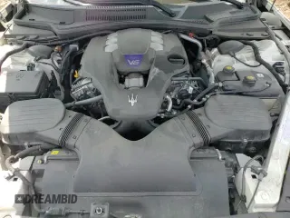 ✅ 2022 Maserati Quattroporte Modena Q4 • VIN: ZAM56YRM5N1387280 • Lot: 64674745. Listed on Copart with 23,604 mi. Free auction sales archive from the USA and detailed vehicle history report at DreamBid. Image 13.