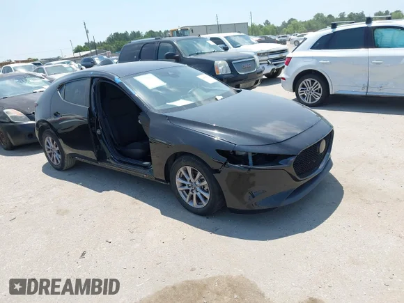 ✅ 2021 Mazda 3 S • VIN: JM1BPAJL2M1308676 • Lot: 44949962. Listed on IAAI with 69,404 mi. Free auction sales archive from the USA and detailed vehicle history report at DreamBid. Image 1.