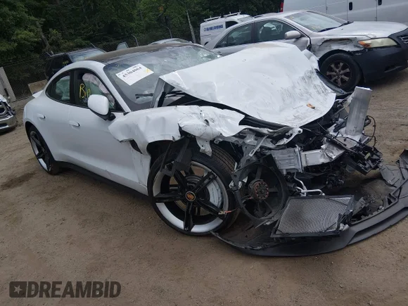 ✅ 2021 Porsche Taycan • VIN: WP0AA2Y19MSA17449 • Lot: 45304064. Wystawiony na IAAI z przebiegiem Nie podano. Bezpłatny archiwum sprzedaży aukcyjnych z USA i szczegółowy raport historii pojazdu na DreamBid. Zdjęcie 1.