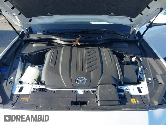 ✅ 2025 Mazda CX-90 Select • VIN: JM3KKAHD4S1220195 • Лот: 43980745. Опубликован ранее на IAAI с пробегом 2 609 миль. Бесплатный доступ к архиву аукционных продаж из США и подробный отчёт об истории автомобиля на DreamBid. Изображение 10.