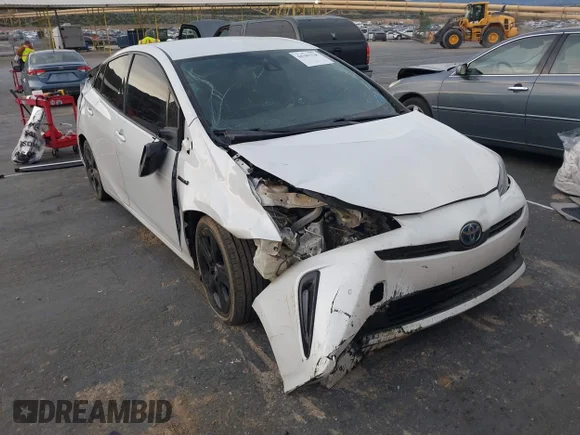 ✅ 2021 Toyota Prius 20th Anniversary Edition • VIN: JTDKAMFU4M3127300 • Lot: 44189238. Listed on IAAI with 116,522 mi. Free auction sales archive from the USA and detailed vehicle history report at DreamBid. Image 1.