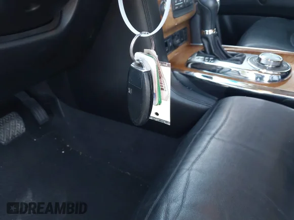 ✅ 2014 Infiniti QX80 • VIN: JN8AZ2NE3E9065233 • Lot: 43994761. Listed on IAAI with 208,942 mi. Free auction sales archive from the USA and detailed vehicle history report at DreamBid. Image 11.