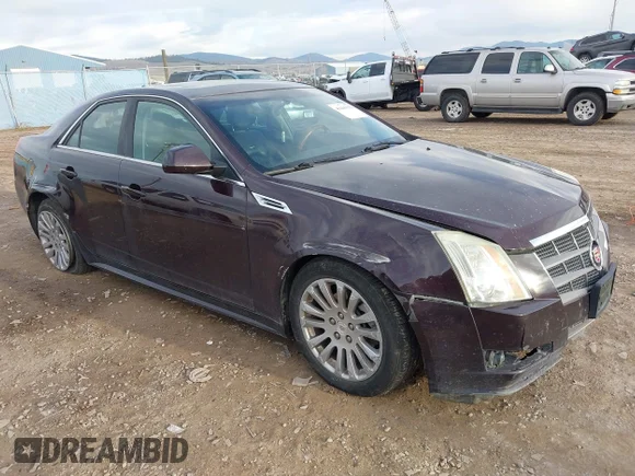 ✅ 2010 Cadillac CTS Premium • VIN: 1G6DS5EVXA0100673 • Lot: 43669152. Listed on IAAI with 134,921 mi. Free auction sales archive from the USA and detailed vehicle history report at DreamBid. Image 1.