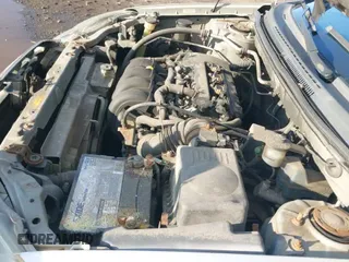 ✅ 2003 Toyota Corolla CE • VIN: 2T1BR32E73C100342 • Lot: 43569405. Listed on IAAI with 299,999 mi. Free auction sales archive from the USA and detailed vehicle history report at DreamBid. Image 14.