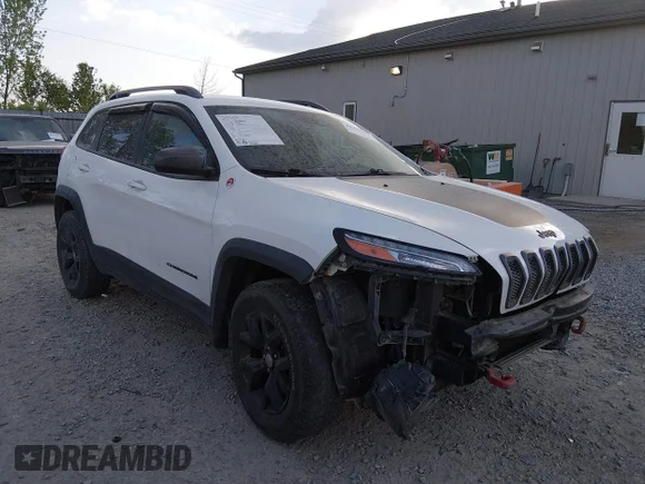 ✅ 2016 Jeep Cherokee Trailhawk • VIN: 1C4PJMBB7GW246844 • Lot: 44924325. Listed on IAAI with 102,690 mi. Free auction sales archive from the USA and detailed vehicle history report at DreamBid. Image 1.