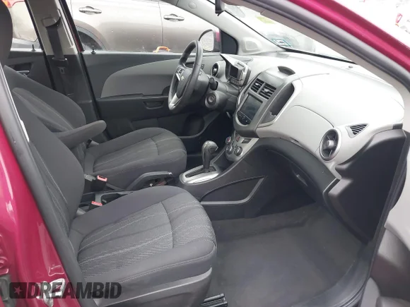 ✅ 2014 Chevrolet Sonic LT • VIN: 1G1JC5SH6E4103217 • Лот: 44279758. Опубликован ранее на IAAI с пробегом 51 819 миль. Бесплатный доступ к архиву аукционных продаж из США и подробный отчёт об истории автомобиля на DreamBid. Изображение 5.