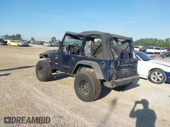 ✅ 1997 Jeep Wrangler Sport • VIN: 1J4FY19S8VP445544 • Lot: 45302946. Wystawiony na IAAI z przebiegiem 170 000 mil. Bezpłatny archiwum sprzedaży aukcyjnych z USA i szczegółowy raport historii pojazdu na DreamBid. Zdjęcie 3.