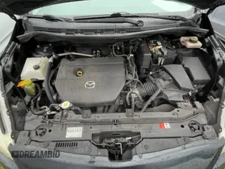 ✅ 2015 Mazda 5 Sport • VIN: JM1CW2BLXF0182880 • Лот: 56959895. Опубликован ранее на Copart с пробегом 117 395 миль. Бесплатный доступ к архиву аукционных продаж из США и подробный отчёт об истории автомобиля на DreamBid. Изображение 11.