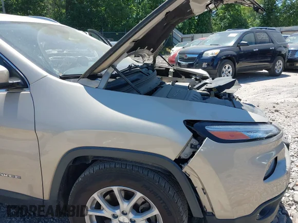✅ 2014 Jeep Cherokee Latitude • VIN: 1C4PJLCB3EW288031 • Lot: 45258284. Listed on IAAI with 118,736 mi. Free auction sales archive from the USA and detailed vehicle history report at DreamBid. Image 6.