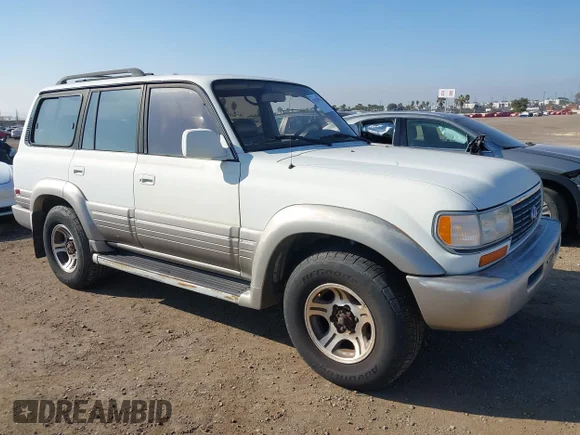 ✅ 1997 Lexus LX 450 • VIN: JT6HJ88J5V0158666 • Lot: 43820751. Listed on IAAI with 321,951 mi. Free auction sales archive from the USA and detailed vehicle history report at DreamBid. Image 1.