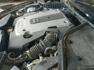 ✅ 2015 Infiniti Q50 • VIN: JN1BV7AP0FM347685 • Lot: 42690285. Listed on IAAI with 126,957 mi. Free auction sales archive from the USA and detailed vehicle history report at DreamBid. Image 19.