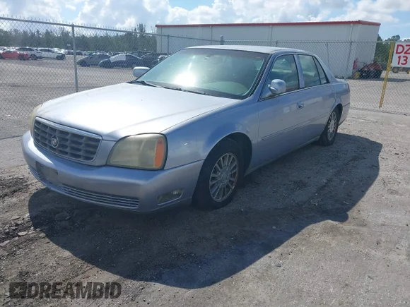 ✅ 2004 Cadillac DeVille DHS • VIN: 1G6KE54Y54U242260 • Lot: 44721143. Listed on IAAI with 13,992 mi. Free auction sales archive from the USA and detailed vehicle history report at DreamBid. Image 2.