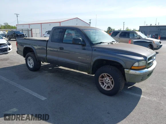 ✅ 2002 Dodge Dakota SLT • VIN: 1B7GG42N12S591568 • Lot: 45098978. Wystawiony na IAAI z przebiegiem 171 027 mil. Bezpłatny archiwum sprzedaży aukcyjnych z USA i szczegółowy raport historii pojazdu na DreamBid. Zdjęcie 1.