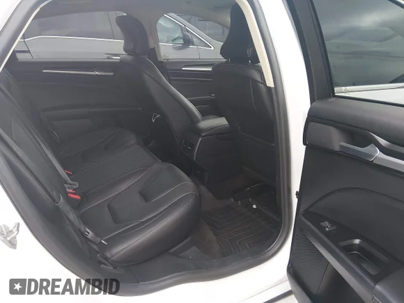 ✅ 2019 Ford Fusion Titanium • VIN: 3FA6P0D9XKR116829 • Lot: 45399360. Listed on IAAI with 97,423 mi. Free auction sales archive from the USA and detailed vehicle history report at DreamBid. Image 8.