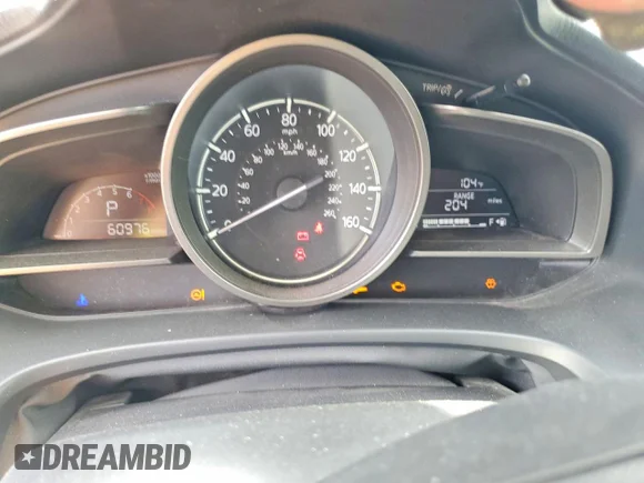 ✅ 2018 Mazda 3 Touring • VIN: 3MZBN1L37JM261496 • Лот: 59082206. Опубліковано раніше на Copart з пробігом 60 976 миль. Безкоштовний доступ до архіву аукціонних продажів зі США та докладний звіт про історію автомобіля на DreamBid. Зображення 9.