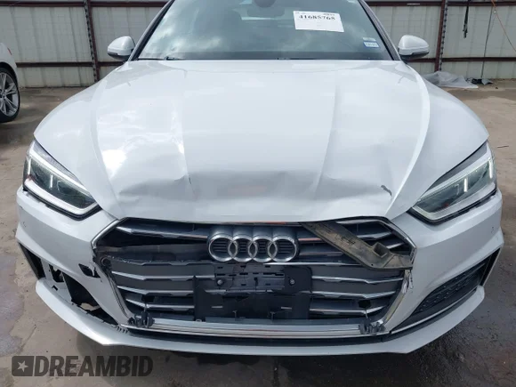 ✅ 2018 Audi A5 Sportback Premium Plus • VIN: WAUENCF5XJA133093 • Lot: 41685765. Wystawiony na IAAI z przebiegiem 94 970 mil. Bezpłatny archiwum sprzedaży aukcyjnych z USA i szczegółowy raport historii pojazdu na DreamBid. Zdjęcie 6.