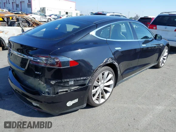 ✅ 2015 Tesla Model S 85D • VIN: 5YJSA1E26FF109238 • Lot: 41647009. Listed on IAAI with 103,447 mi. Free auction sales archive from the USA and detailed vehicle history report at DreamBid. Image 4.