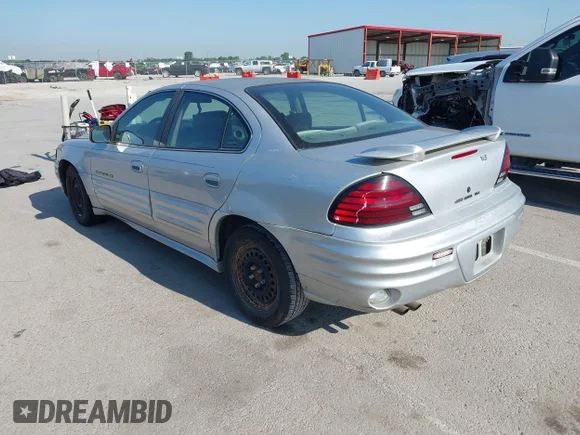 ✅ 2001 Pontiac Grand Am SE1 • VIN: 1G2NF52E21M635567 • Lot: 42621959. Wystawiony na IAAI z przebiegiem 220 173 mil. Bezpłatny archiwum sprzedaży aukcyjnych z USA i szczegółowy raport historii pojazdu na DreamBid. Zdjęcie 3.