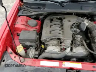 ✅ 2009 Dodge Challenger SE • VIN: 2B3LJ44V69H633099 • Lot: 84082194. Wystawiony na Copart z przebiegiem 184 640 mil. Bezpłatny archiwum sprzedaży aukcyjnych z USA i szczegółowy raport historii pojazdu na DreamBid. Zdjęcie 13.