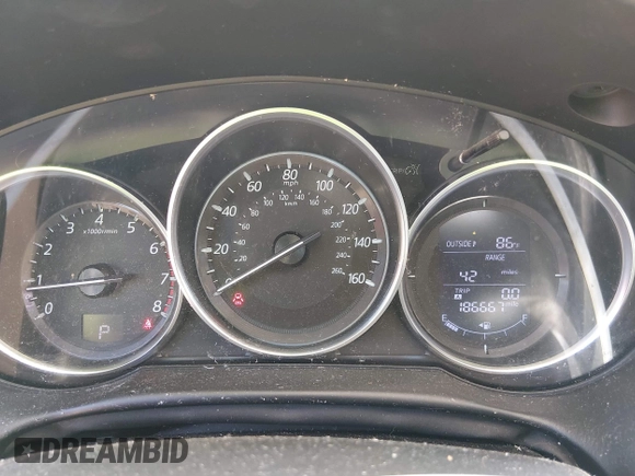 ✅ 2016 Mazda CX-5 Touring • VIN: JM3KE2CY7G0762265 • Lot: 44872846. Wystawiony na IAAI z przebiegiem 186 667 mil. Bezpłatny archiwum sprzedaży aukcyjnych z USA i szczegółowy raport historii pojazdu na DreamBid. Zdjęcie 7.