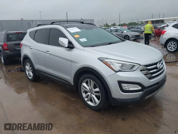 ✅ 2014 Hyundai Santa Fe • VIN: 5XYZWDLA5EG177601 • Lot: 41888782. Wystawiony na IAAI z przebiegiem 109 421 mil. Bezpłatny archiwum sprzedaży aukcyjnych z USA i szczegółowy raport historii pojazdu na DreamBid. Zdjęcie 1.