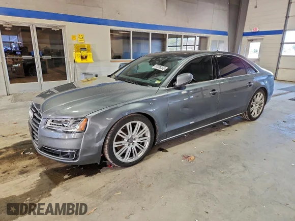 ✅ 2015 Audi A8 3.0T • VIN: WAU3GAFD8FN037735 • Лот: 97926265. Опубликован ранее на Copart с пробегом 129 308 миль. Бесплатный доступ к архиву аукционных продаж из США и подробный отчёт об истории автомобиля на DreamBid. Изображение 1.