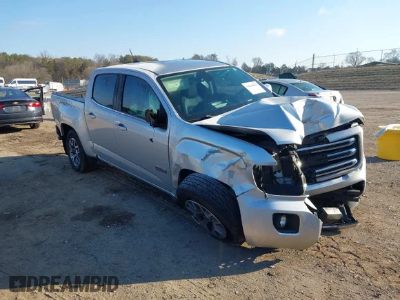 ✅ 2015 GMC Canyon 4WD SLE • VIN: 1GTG6BE35F1212424 • Лот: 44220869. Опубликован ранее на IAAI с пробегом 133 765 миль. Бесплатный доступ к архиву аукционных продаж из США и подробный отчёт об истории автомобиля на DreamBid. Изображение 1.