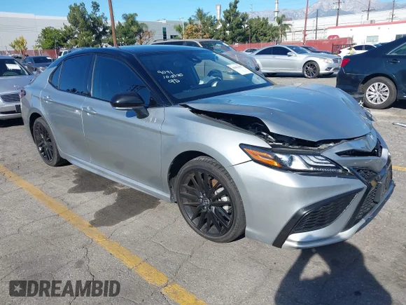 ✅ 2022 Toyota Camry Hybrid XSE • VIN: 4T1K31AK5NU038843 • Lot: 43851092. Wystawiony na IAAI z przebiegiem 102 172 mil. Bezpłatny archiwum sprzedaży aukcyjnych z USA i szczegółowy raport historii pojazdu na DreamBid. Zdjęcie 1.