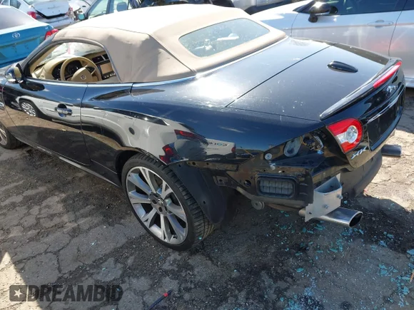 ✅ 2014 Jaguar XK • VIN: SAJWA4GB0ELB52358 • Lot: 41832850. Wystawiony na IAAI z przebiegiem 93 037 mil. Bezpłatny archiwum sprzedaży aukcyjnych z USA i szczegółowy raport historii pojazdu na DreamBid. Zdjęcie 3.