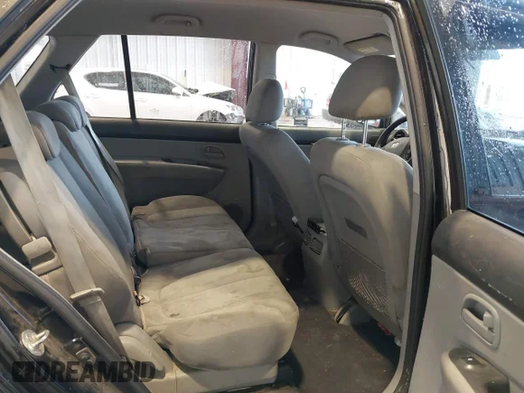 ✅ 2009 Kia Rondo LX • VIN: KNAFG528297278647 • Lot: 42139810. Listed on IAAI with 161,314 mi. Free auction sales archive from the USA and detailed vehicle history report at DreamBid. Image 8.