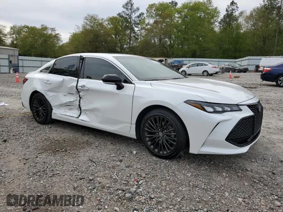 ✅ 2020 Toyota Avalon Hybrid XSE • VIN: 4T1E21FBXLU013524 • Lot: 46829863. Wystawiony na Copart z przebiegiem 65 943 mil. Bezpłatny archiwum sprzedaży aukcyjnych z USA i szczegółowy raport historii pojazdu na DreamBid. Zdjęcie 4.