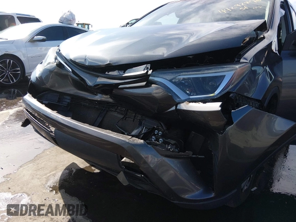 ✅ 2016 Toyota RAV4 LE • VIN: 2T3BFREVXGW529672 • Lot: 44292876. Wystawiony na IAAI z przebiegiem 129 878 mil. Bezpłatny archiwum sprzedaży aukcyjnych z USA i szczegółowy raport historii pojazdu na DreamBid. Zdjęcie 6.